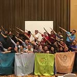 Elite Indigo members and event participants posing together for photos at the event